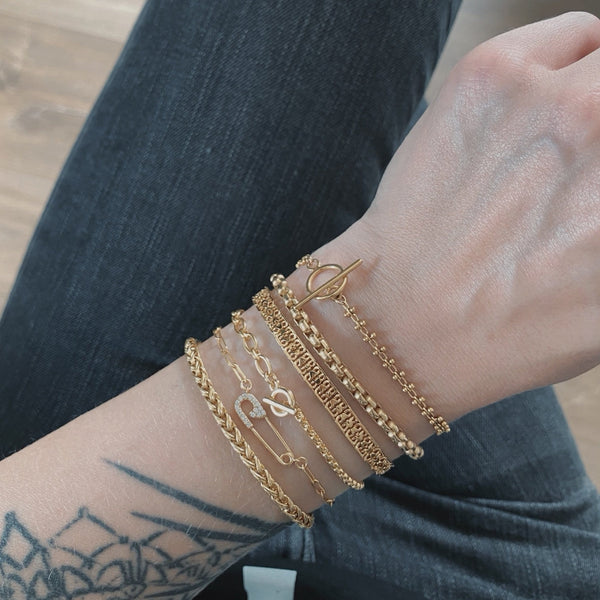 Pin de pulsera